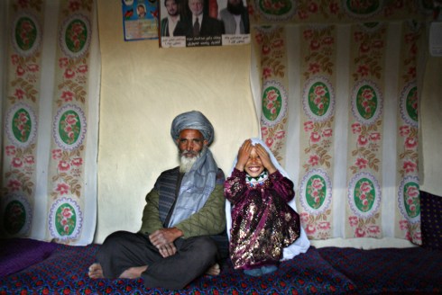 Said Mohammed, 55, and Roshan Kasem, 8, on the day of their engagement in the village of Chavosh on Sept. 10, 2005. The father of the bride, Abdul Kasem, 60, said he is unhappy giving his daughter away at such a young age, but has no choice due to severe poverty. Said Mohammed, 55, and Roshan Kasem, 8, on the day of their engagement in the village of Chavosh on Sept. 10, 2005. The father of the bride, Abdul Kasem, 60, said he is unhappy giving his daughter away at such a young age, but has no choice due to severe poverty.