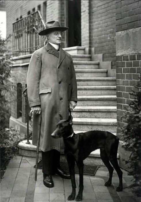 August Sander portrait of a man with dog